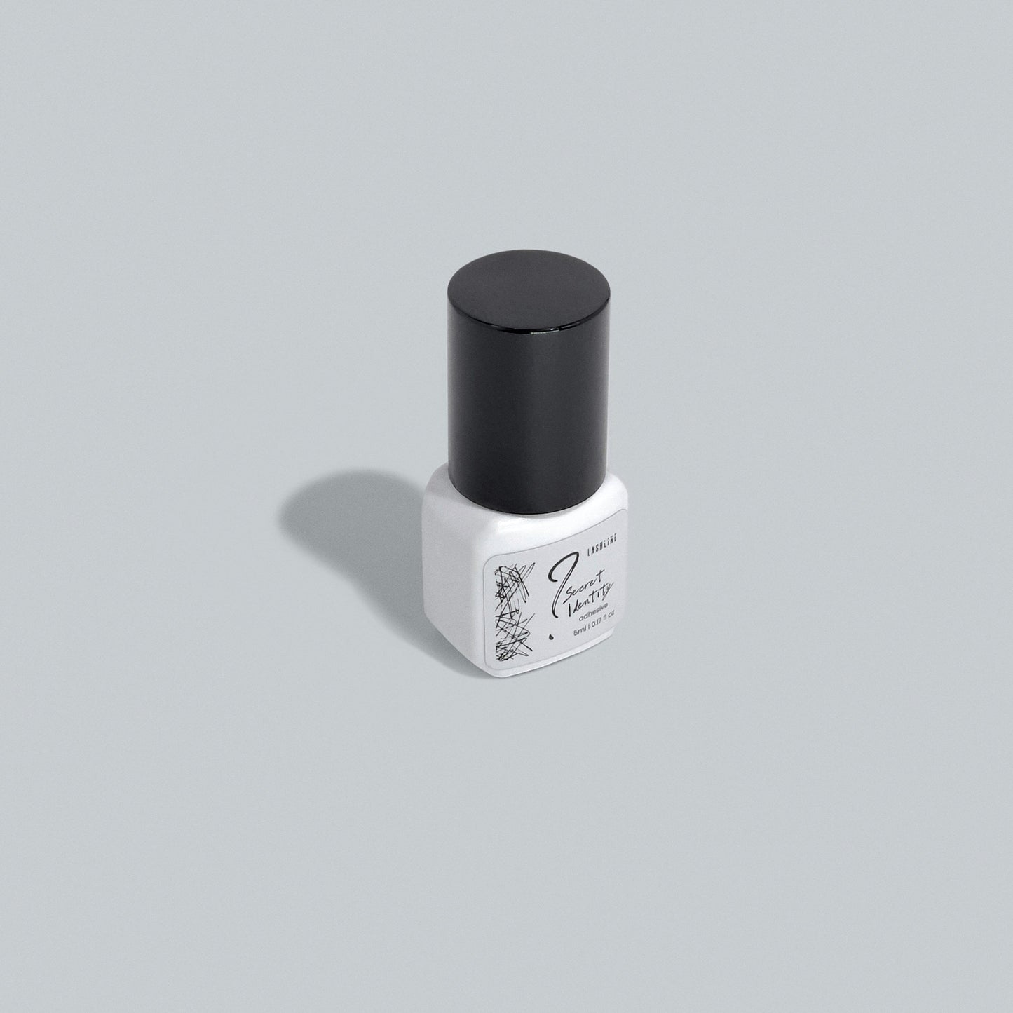 Secret Identity Adhesive